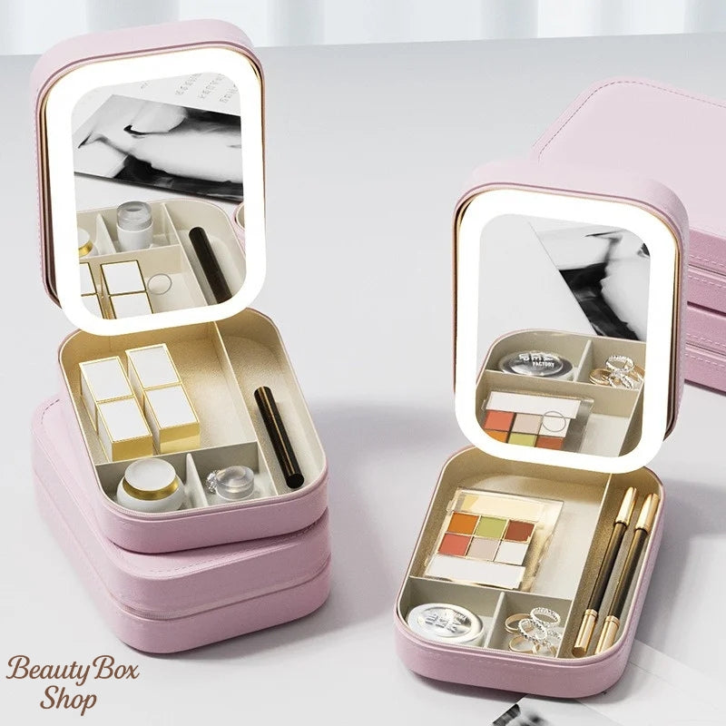 Glow & Go Pink - photo of several cases, two open with LED Lights & several others closed - Beauty Box Shop